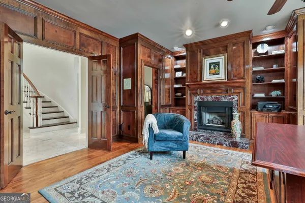 a kitchen with stainless steel appliances granite countertop a refrigerator sink and stove