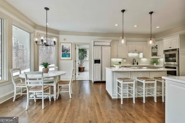 a en suite bathroom with a sink a mirror and a shower