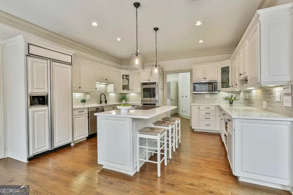 a view of a swimming pool with a outdoor seating