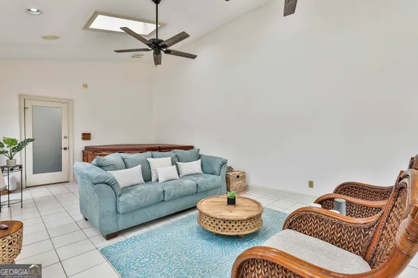 a view of swimming pool with outdoor seating