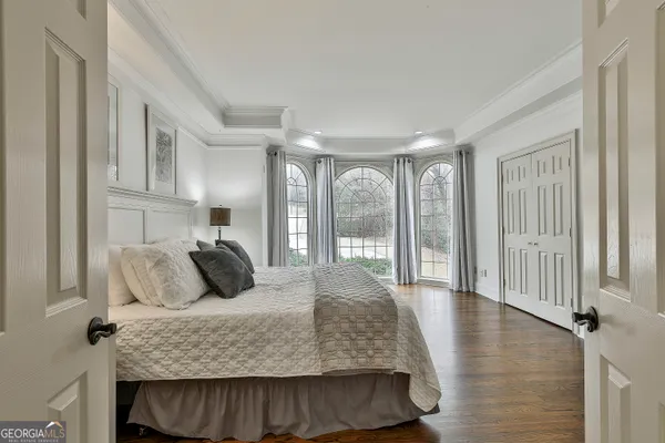 an aerial view of a house with outdoor space pool seating area and yard