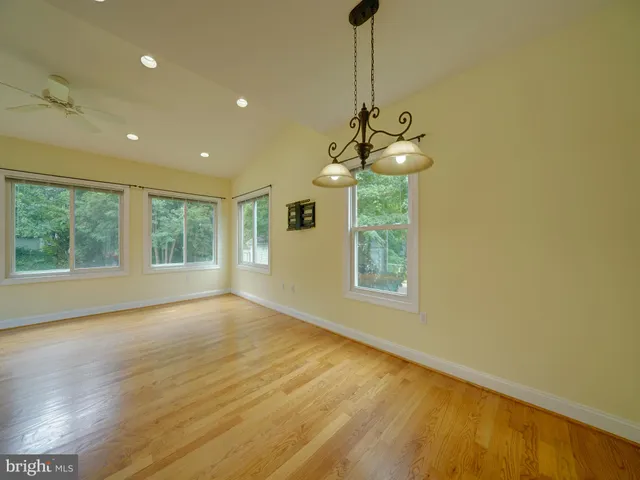 a kitchen with a sink stove and microwave