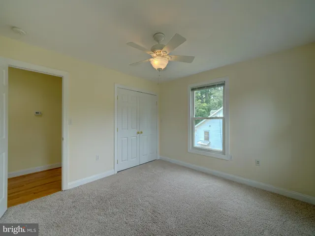 a view of a backyard with a garden