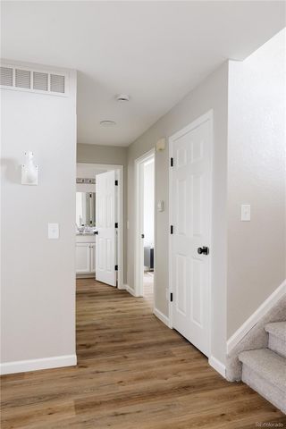 a view of a livingroom with wooden floor