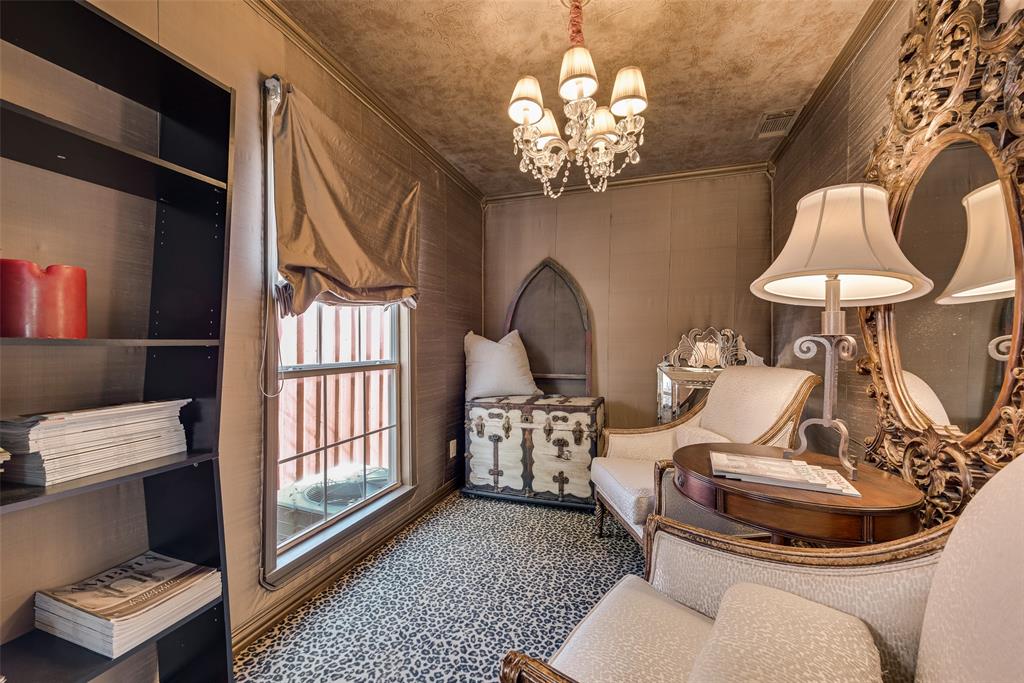 3022 Aster Street Dallas, TX 75211 - Photo 20 of 31 a living room with furniture a chandelier and a window
