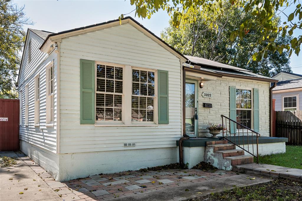 3022 Aster Street Dallas, TX 75211 - Photo 5 of 31 a front view of a house with sitting area