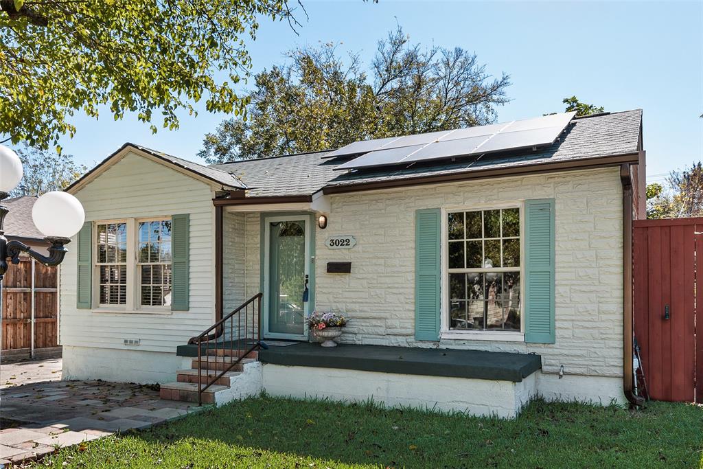 3022 Aster Street Dallas, TX 75211 - Photo 9 of 31 a front view of a house with a yard