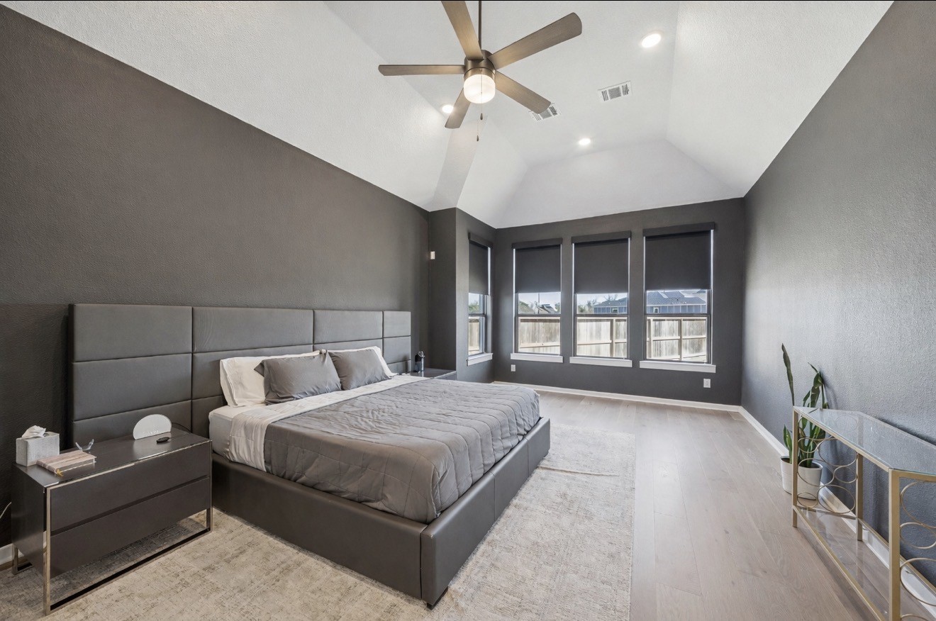 8703 Blue Grotto Lane Manvel, TX 77578 - Photo 15 of 43 This stunning and primary bathroom is massive with bay windows overlooking the backyard.