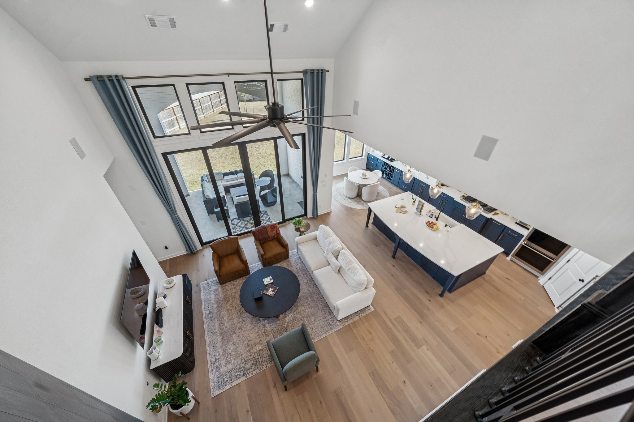8703 Blue Grotto Lane Manvel, TX 77578 - Photo 26 of 43 The view of the living room from the upstairs game room.