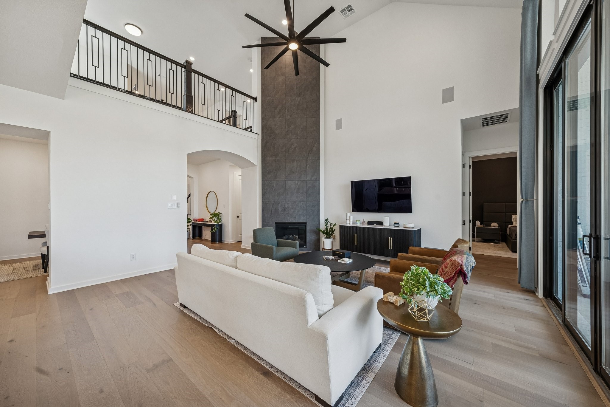 8703 Blue Grotto Lane Manvel, TX 77578 - Photo 8 of 43 Note the game room loft area that overlooks the living room.