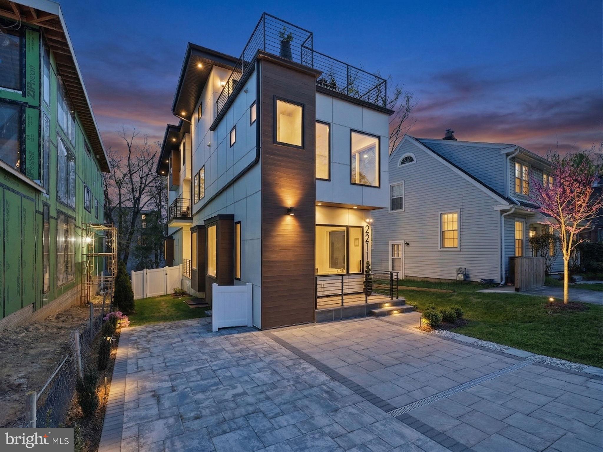 2211 Military Road Arlington, VA 22207 - Photo 3 of 107 Modern home with stunning evening glow.