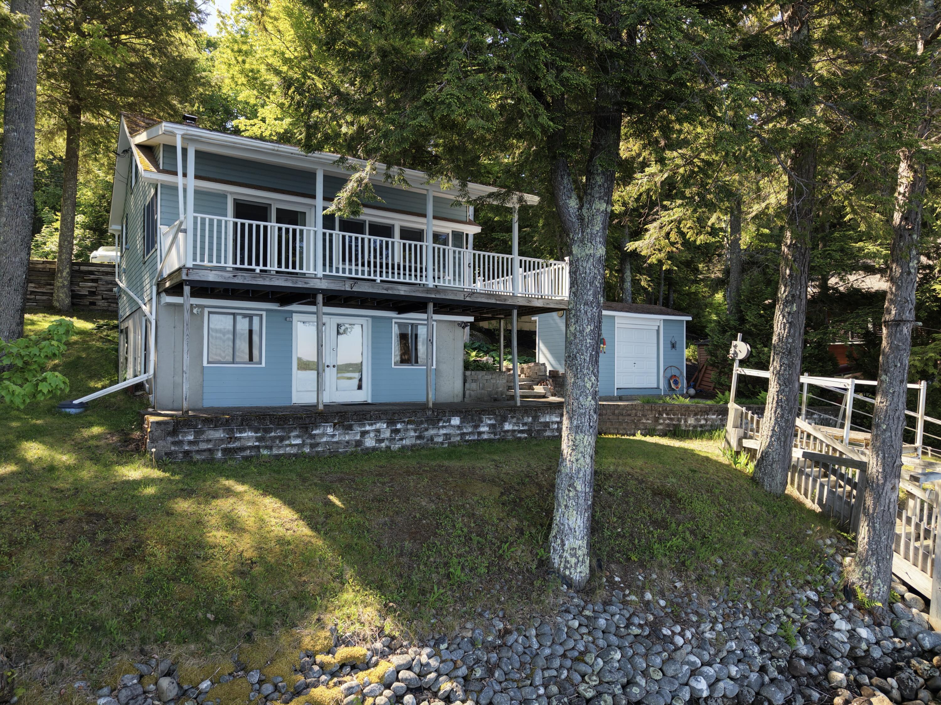 320 Redcedar Lane Sidney, ME 04330 - Photo 54 of 59 Patio area over looks water