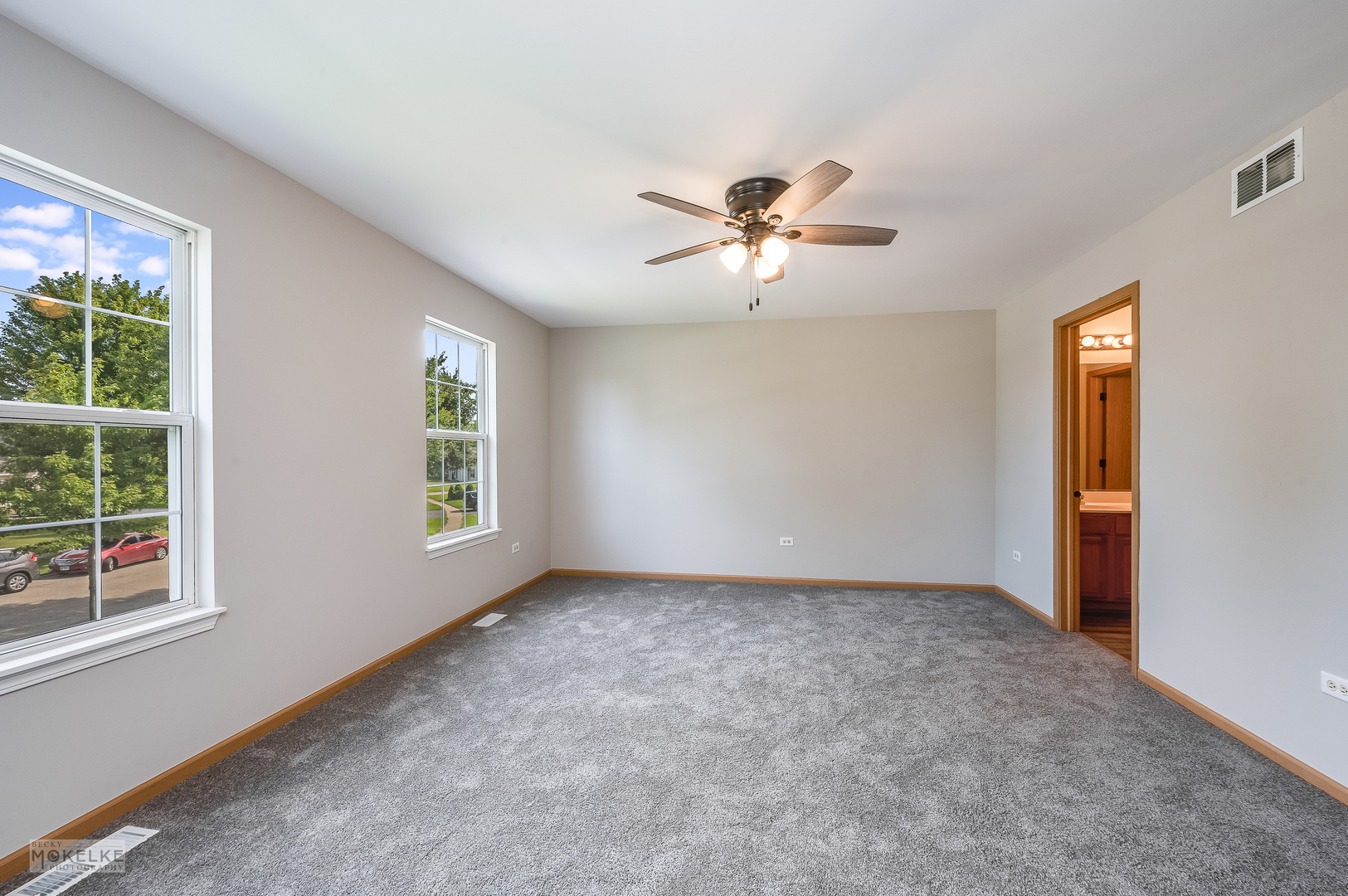 4212 Dillon Street Plano, IL 60545 - Photo 17 of 26 a view of room with a ceiling fan and window