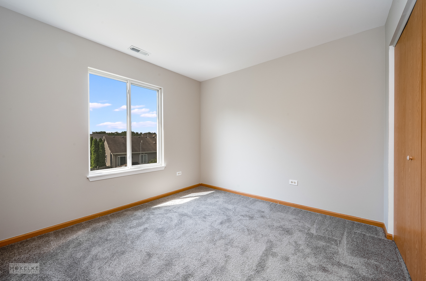 4212 Dillon Street Plano, IL 60545 - Photo 20 of 26 an empty room with a window