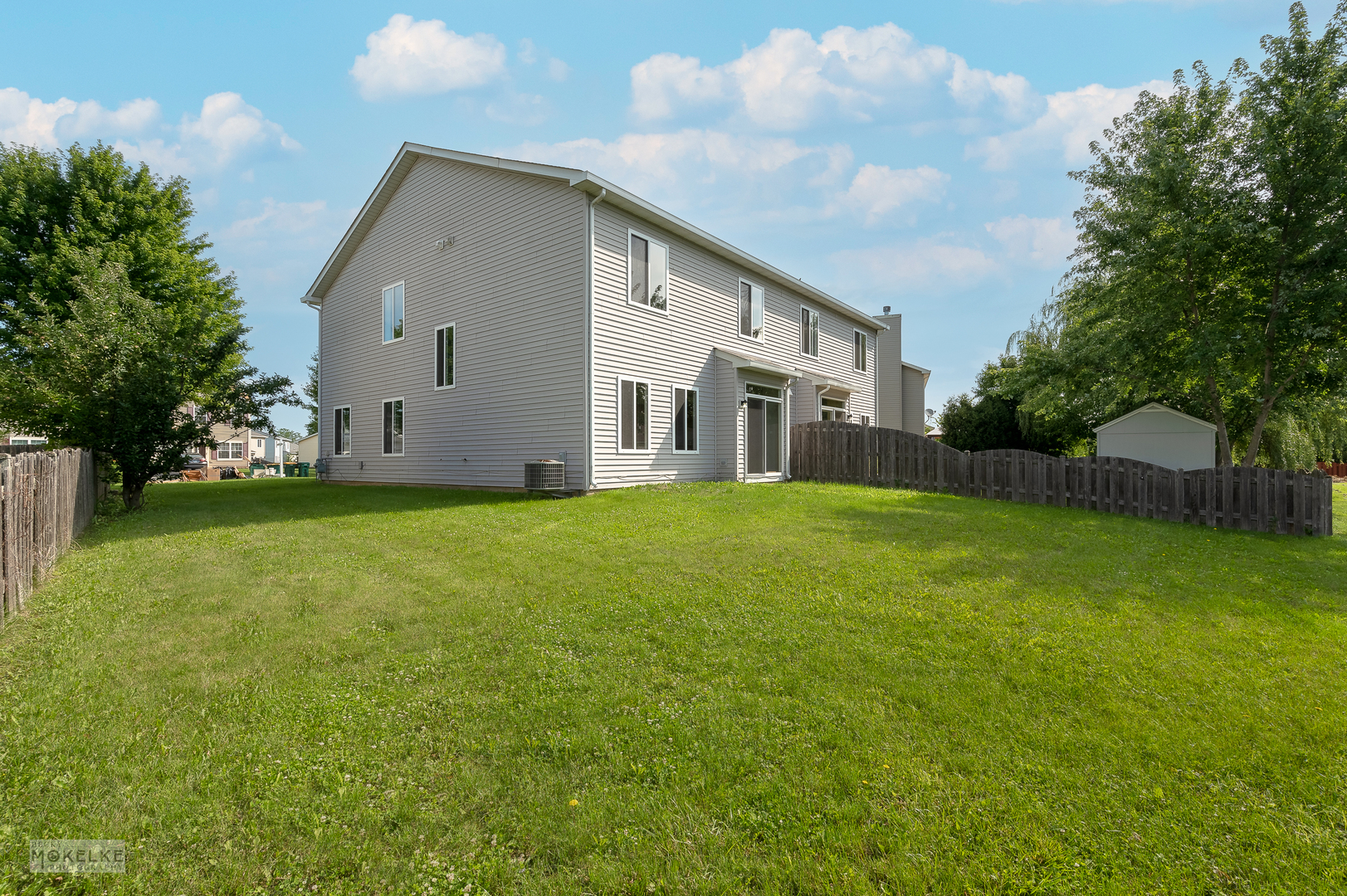4212 Dillon Street Plano, IL 60545 - Photo 4 of 26 a front view of house with yard and trees
