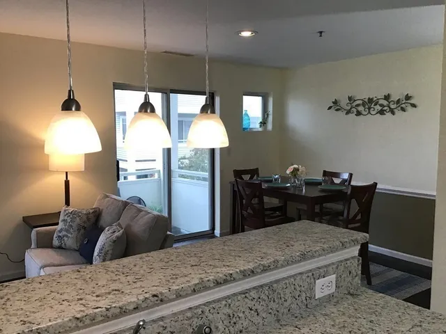 a bed room with a bed and a lamp