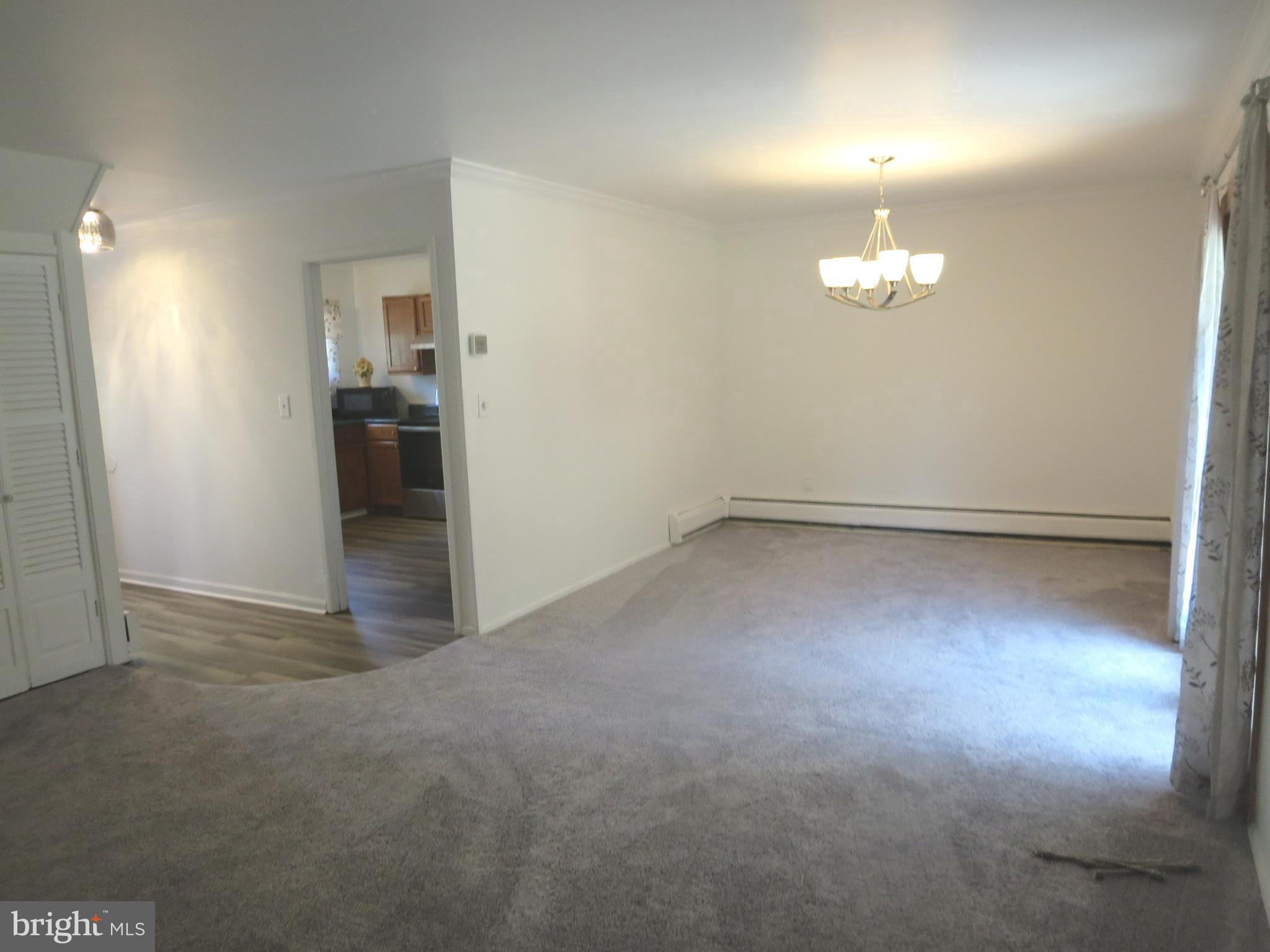 52 Hollow Road Levittown, PA 19056 - Photo 27 of 51 Dining Room with Kitchen /Foyer Entrance