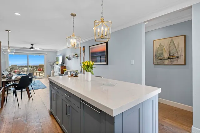 a kitchen with a table and chairs