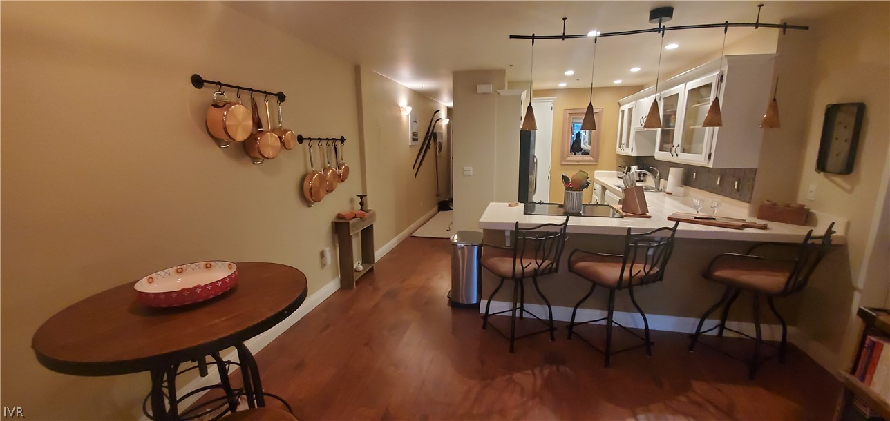 333 Ski Way, Unit 275 Incline Village, NV 89451 - Photo 12 of 18 a view of a dining room with furniture and wooden floor