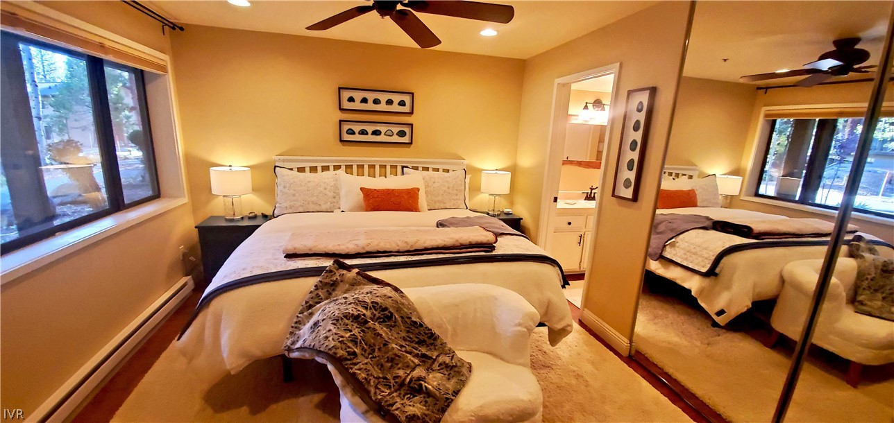 333 Ski Way, Unit 275 Incline Village, NV 89451 - Photo 14 of 18 a bedroom with a bed and wooden floor