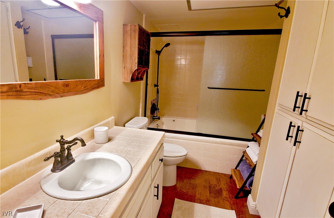 333 Ski Way, Unit 275 Incline Village, NV 89451 - Photo 16 of 18 a bathroom with a sink and a mirror