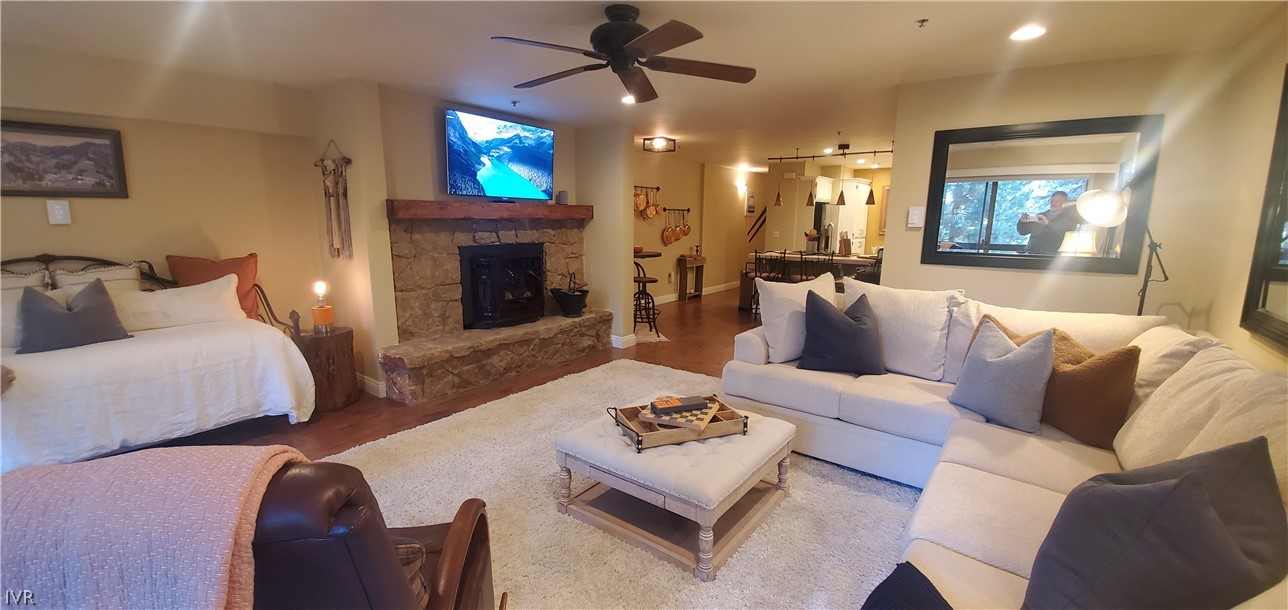 333 Ski Way, Unit 275 Incline Village, NV 89451 - Photo 2 of 18 a living room with furniture a fireplace and a flat screen tv