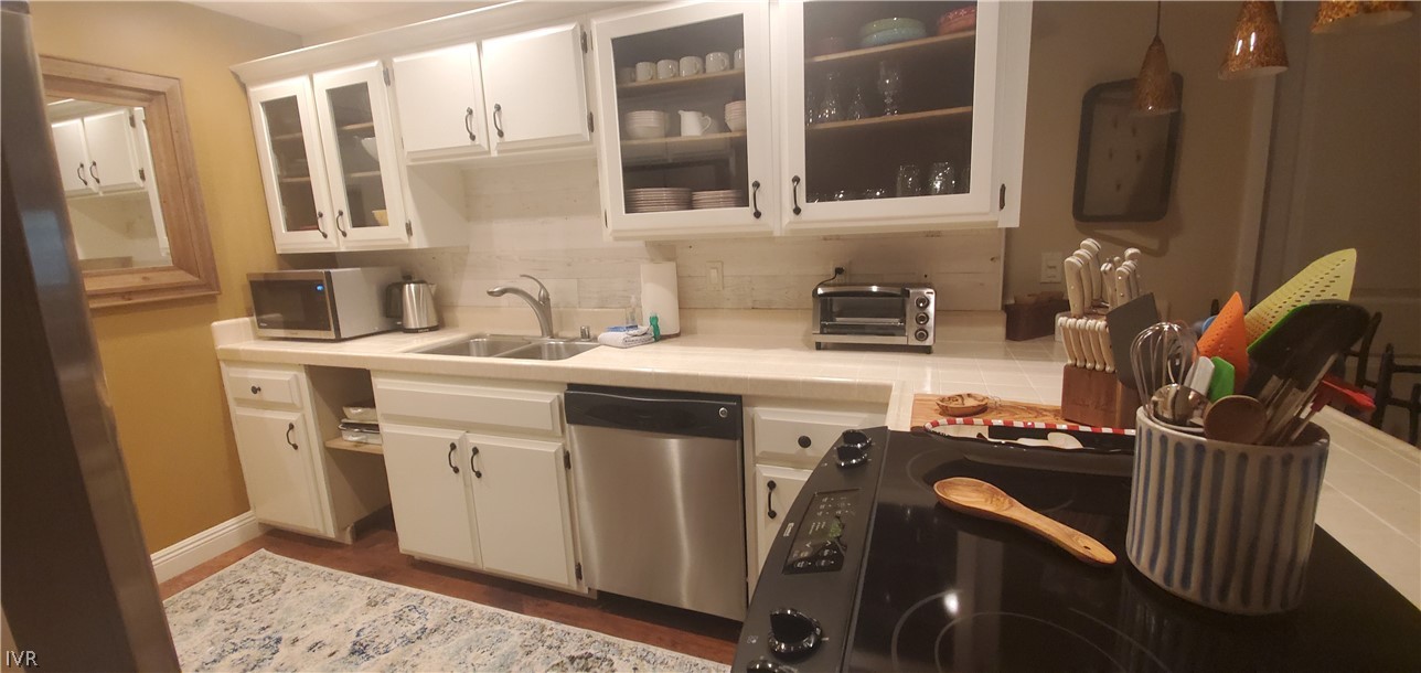 333 Ski Way, Unit 275 Incline Village, NV 89451 - Photo 9 of 18 a utility room with dryer and washer