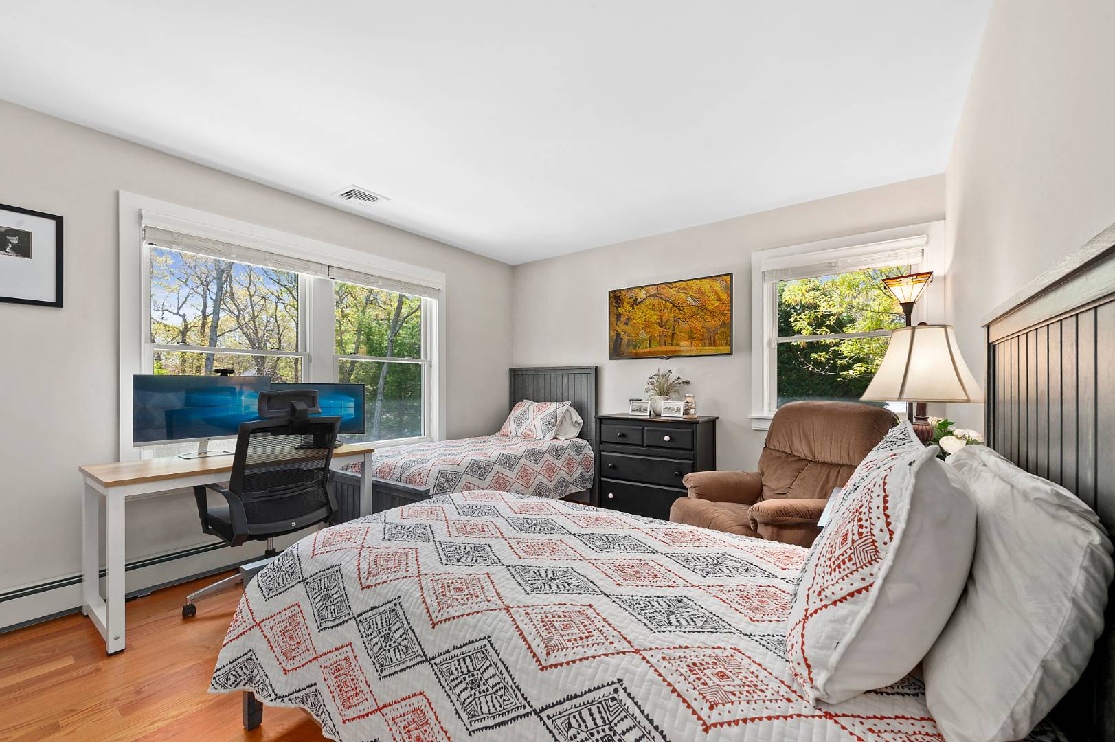 231 Norfolk Drive East Hampton, NY 11937 - Photo 11 of 17 a bedroom with furniture and a large window