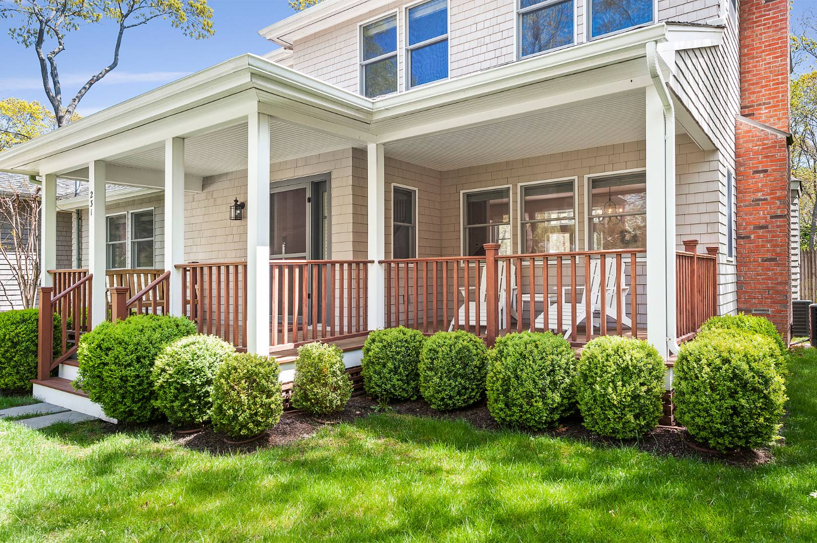 231 Norfolk Drive East Hampton, NY 11937 - Photo 17 of 17 front view of a house with a yard