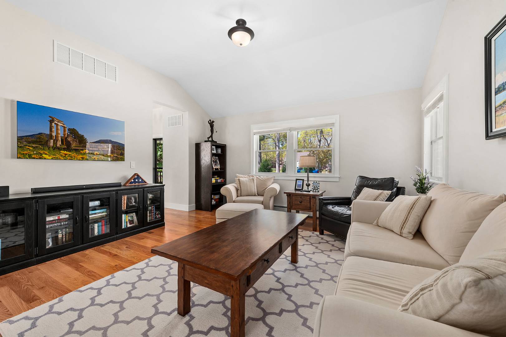 231 Norfolk Drive East Hampton, NY 11937 - Photo 8 of 17 a living room with furniture a rug and a window