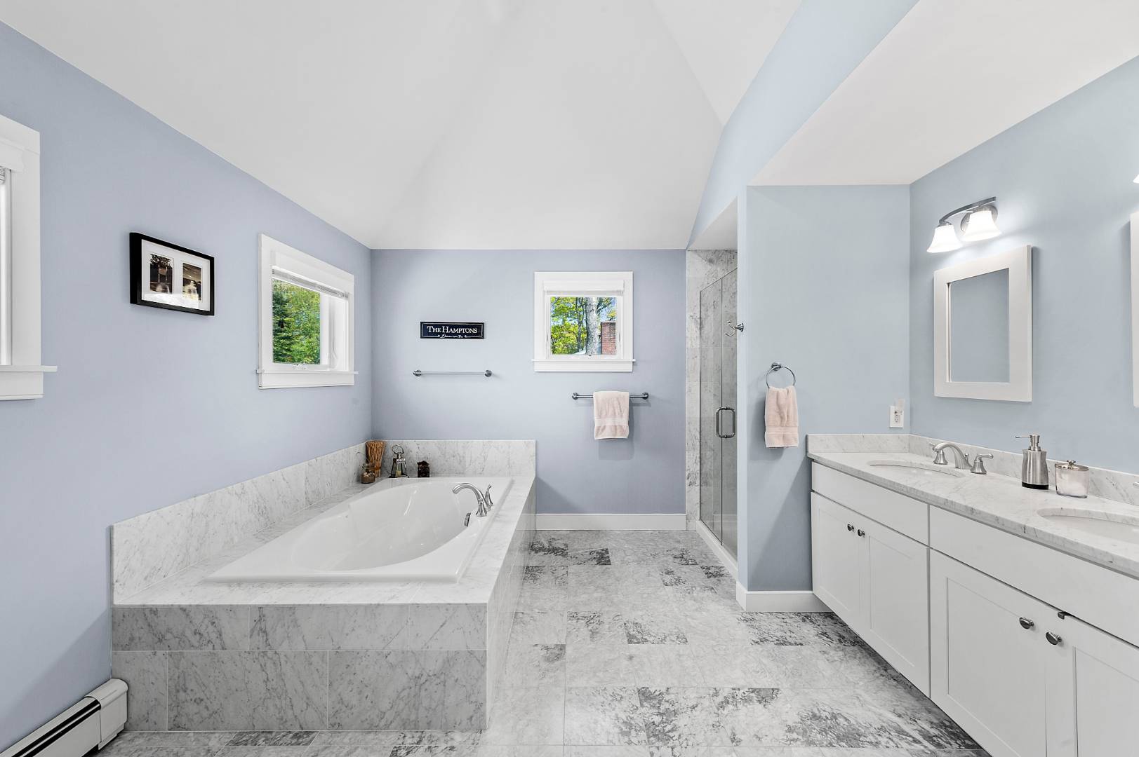 231 Norfolk Drive East Hampton, NY 11937 - Photo 10 of 17 a bathroom with a sink and a mirror