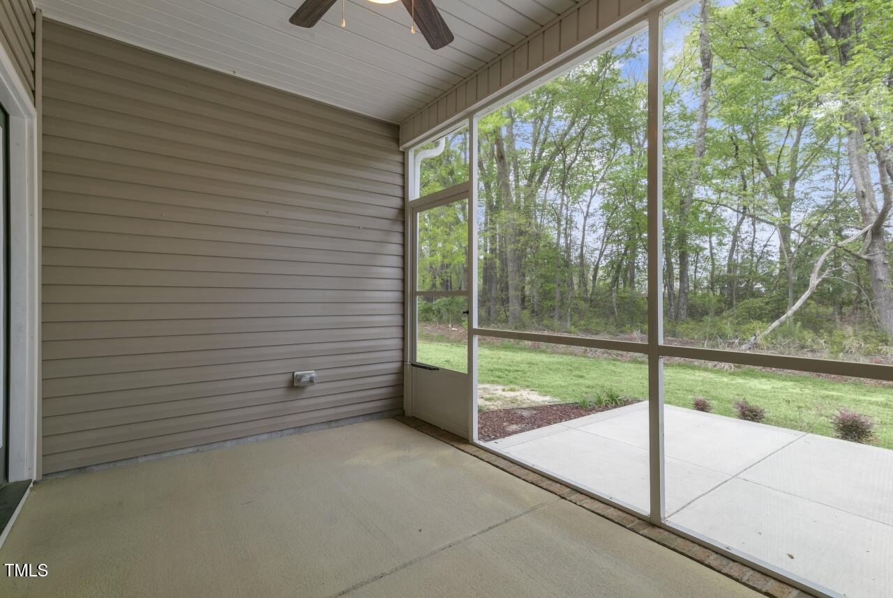 24 Highmeadow Lane Clayton, NC 27520 - Photo 17 of 37 a view of a room with porch and a yard