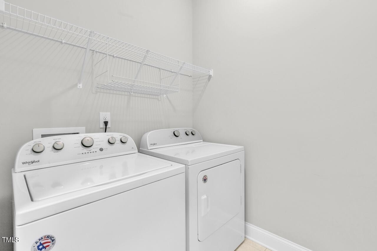 24 Highmeadow Lane Clayton, NC 27520 - Photo 19 of 37 a utility room with dryer and washer