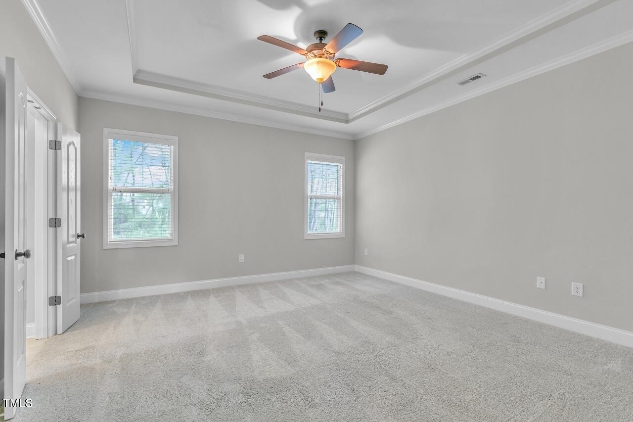 24 Highmeadow Lane Clayton, NC 27520 - Photo 21 of 37 a view of an empty room with a window