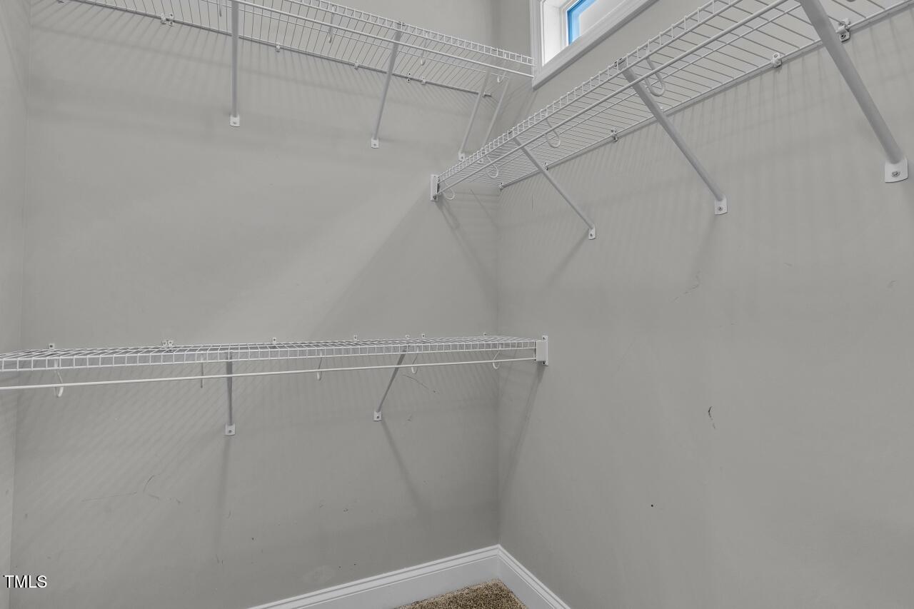 24 Highmeadow Lane Clayton, NC 27520 - Photo 25 of 37 a view of a room with racks on the wall