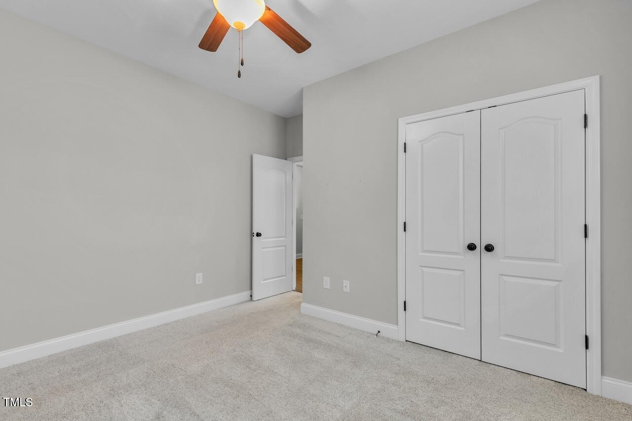 24 Highmeadow Lane Clayton, NC 27520 - Photo 31 of 37 a view of an empty room