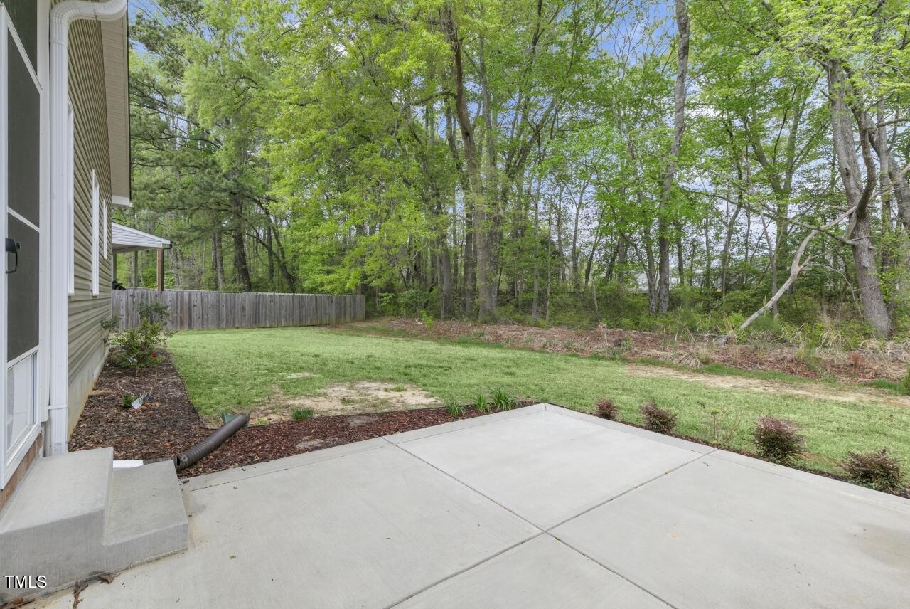 24 Highmeadow Lane Clayton, NC 27520 - Photo 32 of 37 a view of backyard with green space