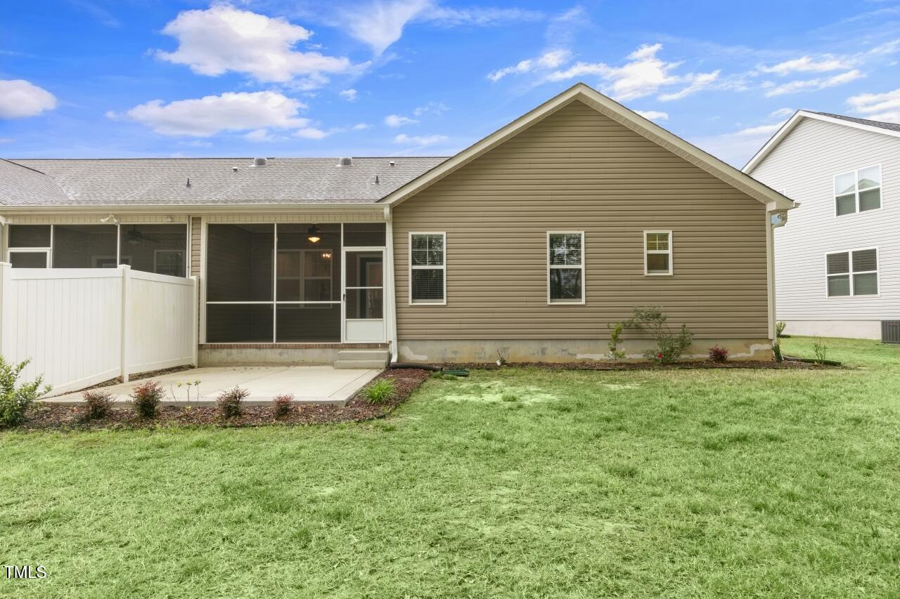 24 Highmeadow Lane Clayton, NC 27520 - Photo 34 of 37 a front view of a house with a yard