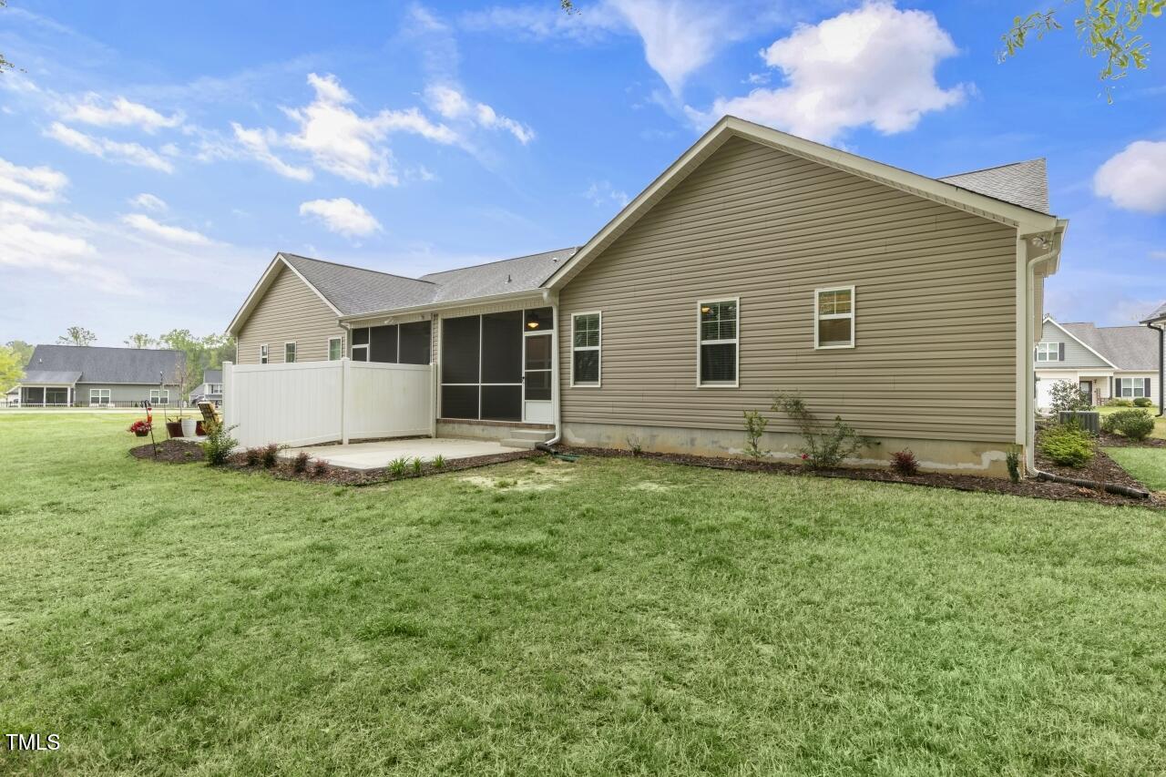 24 Highmeadow Lane Clayton, NC 27520 - Photo 35 of 37 a view of a backyard of the house