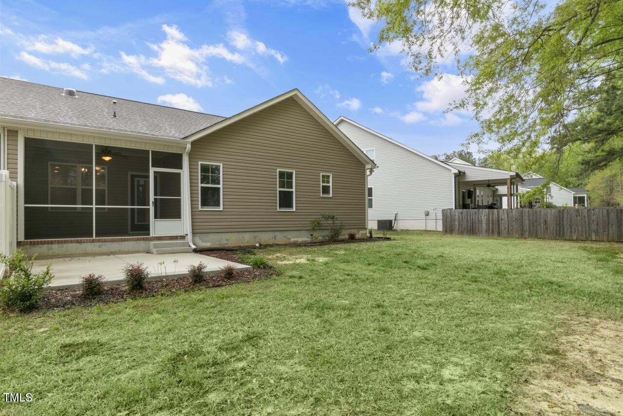 24 Highmeadow Lane Clayton, NC 27520 - Photo 36 of 37 a house that has a lot of plants in it
