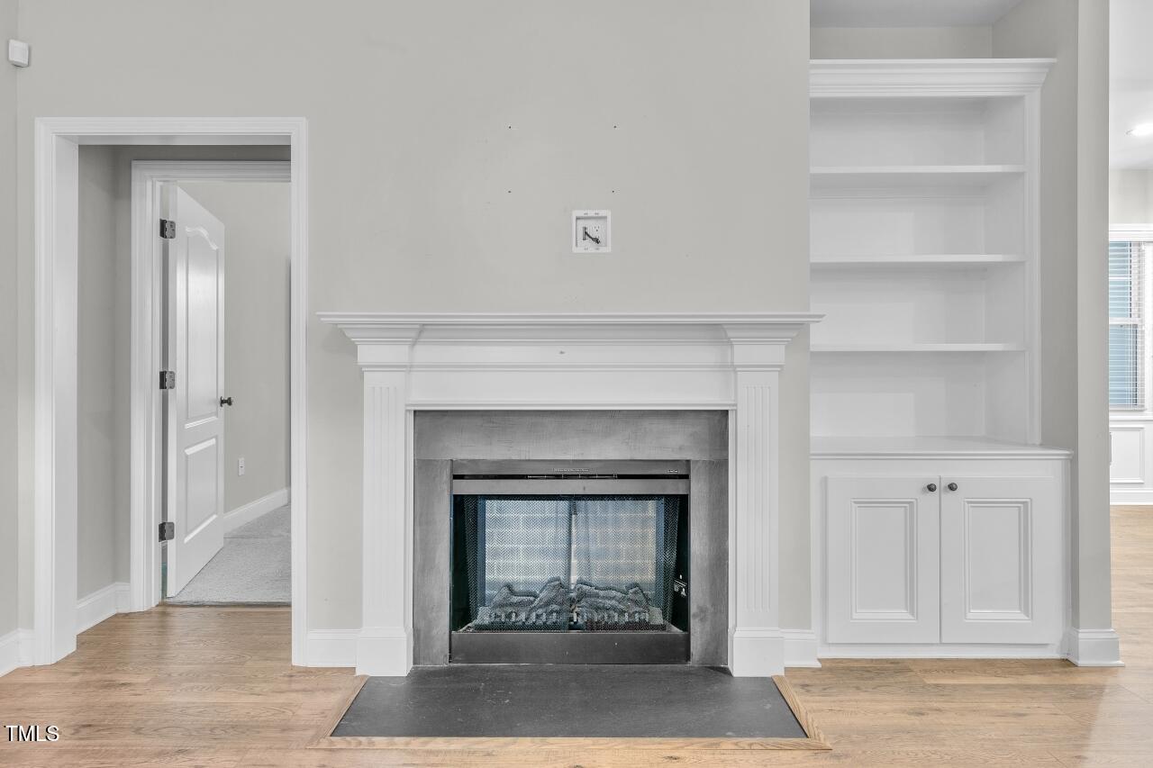 24 Highmeadow Lane Clayton, NC 27520 - Photo 9 of 37 a living room with a fireplace
