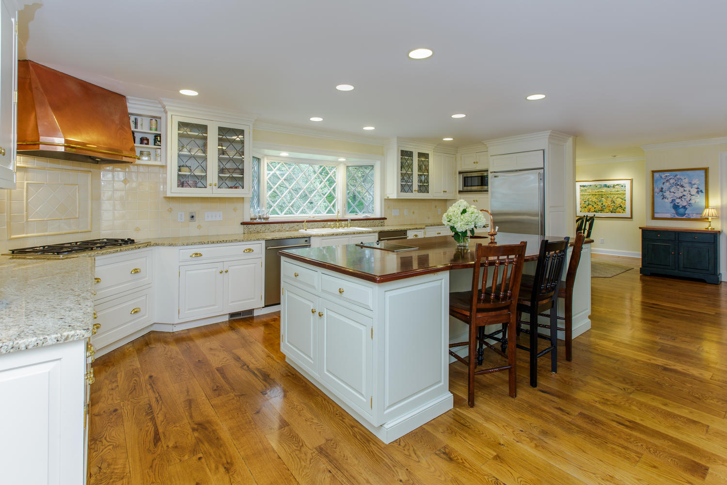 109 Rosebrook Road New Canaan, CT 06840 - Photo 15 of 47 a kitchen with granite countertop a sink and counter space