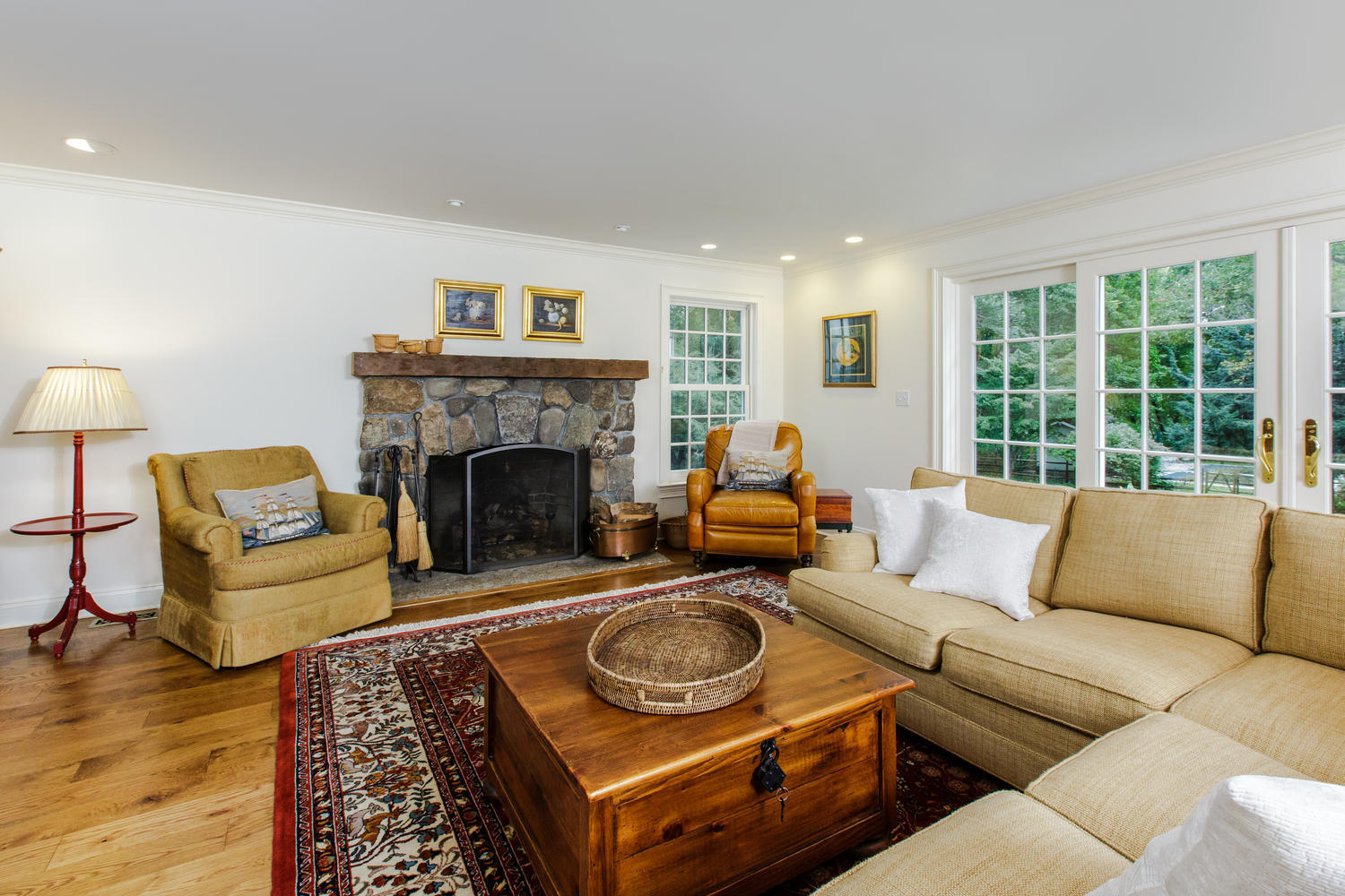 109 Rosebrook Road New Canaan, CT 06840 - Photo 18 of 47 a living room with furniture and a fireplace