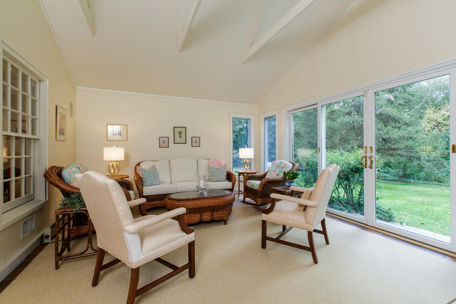 109 Rosebrook Road New Canaan, CT 06840 - Photo 20 of 47 a living room with furniture and a large window