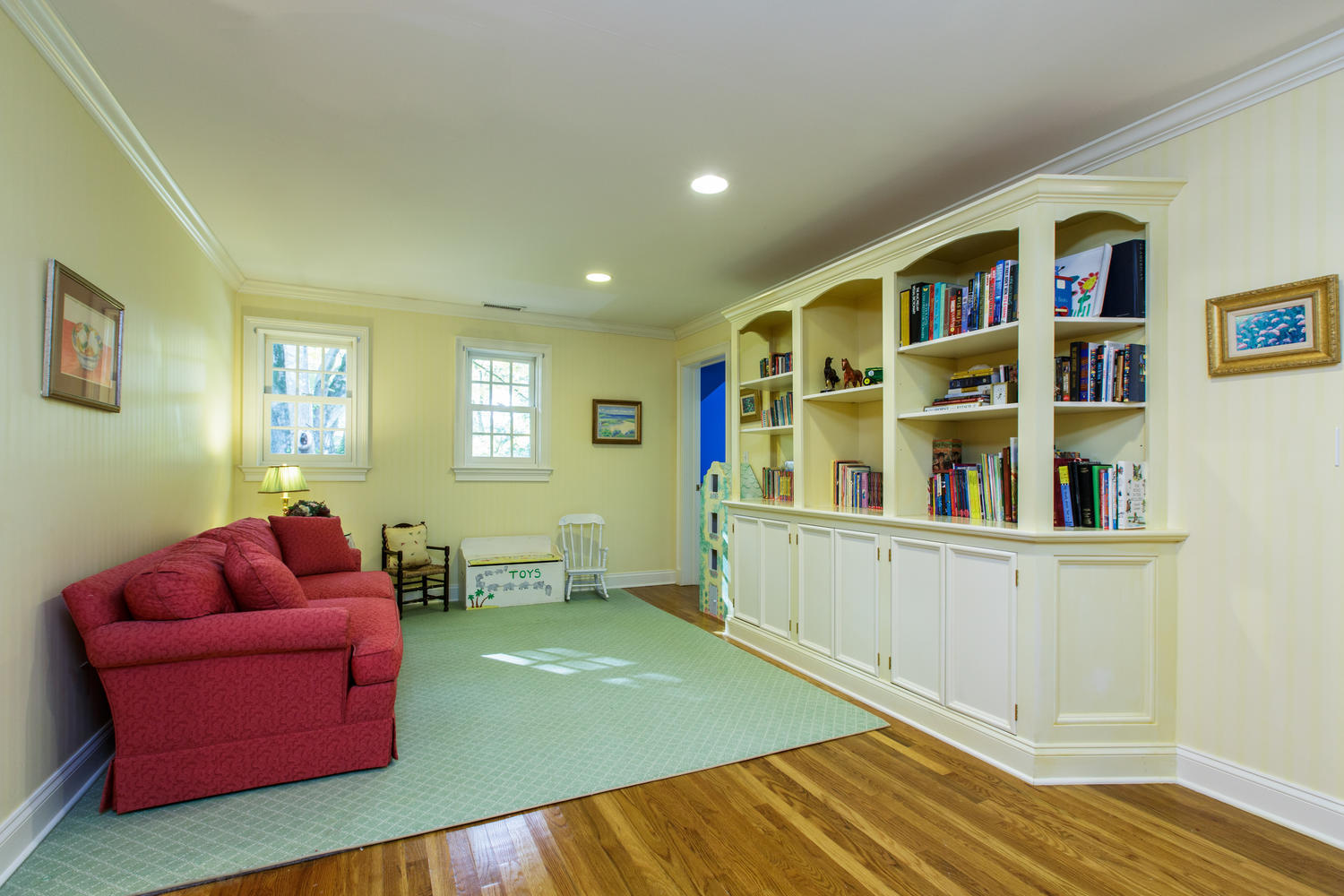 109 Rosebrook Road New Canaan, CT 06840 - Photo 28 of 47 a living room with furniture and a wooden floor