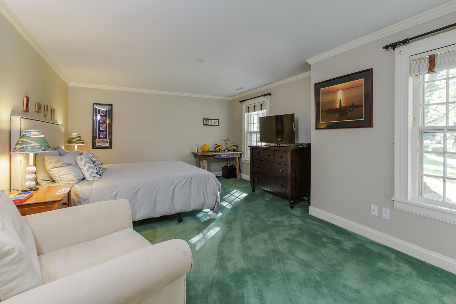 109 Rosebrook Road New Canaan, CT 06840 - Photo 30 of 47 a bedroom with a bed and a television