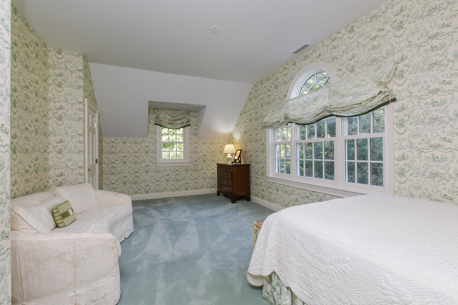 109 Rosebrook Road New Canaan, CT 06840 - Photo 32 of 47 a spacious bedroom with a bed and a large window