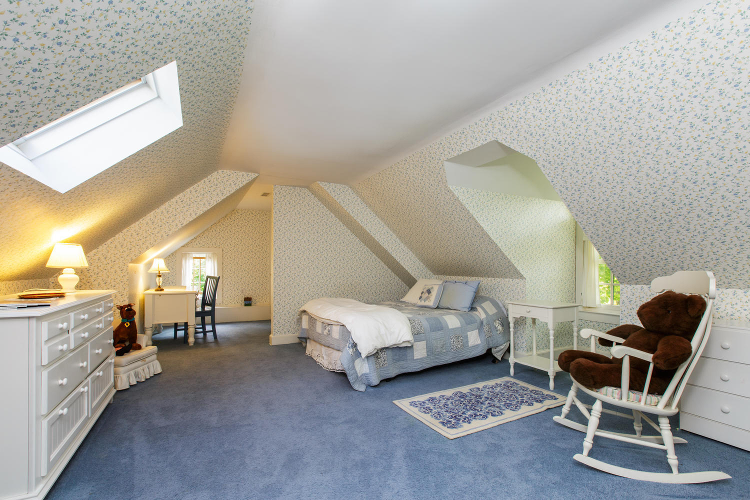 109 Rosebrook Road New Canaan, CT 06840 - Photo 33 of 47 a spacious bedroom with a bed and a chair
