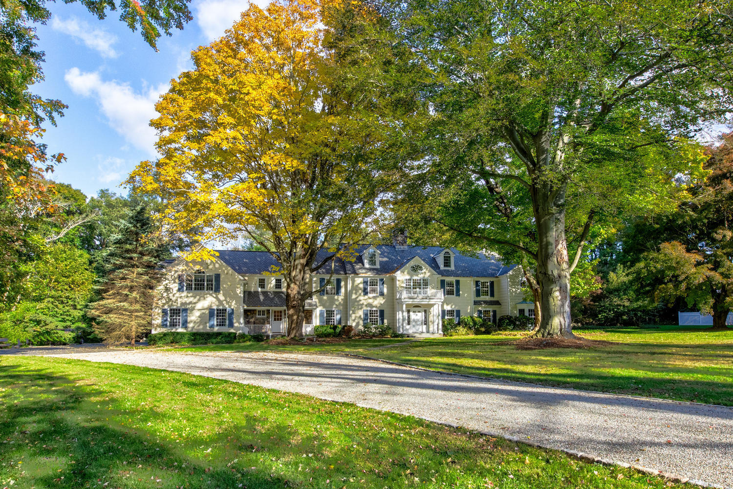 109 Rosebrook Road New Canaan, CT 06840 - Photo 42 of 47 a building view with a garden and trees