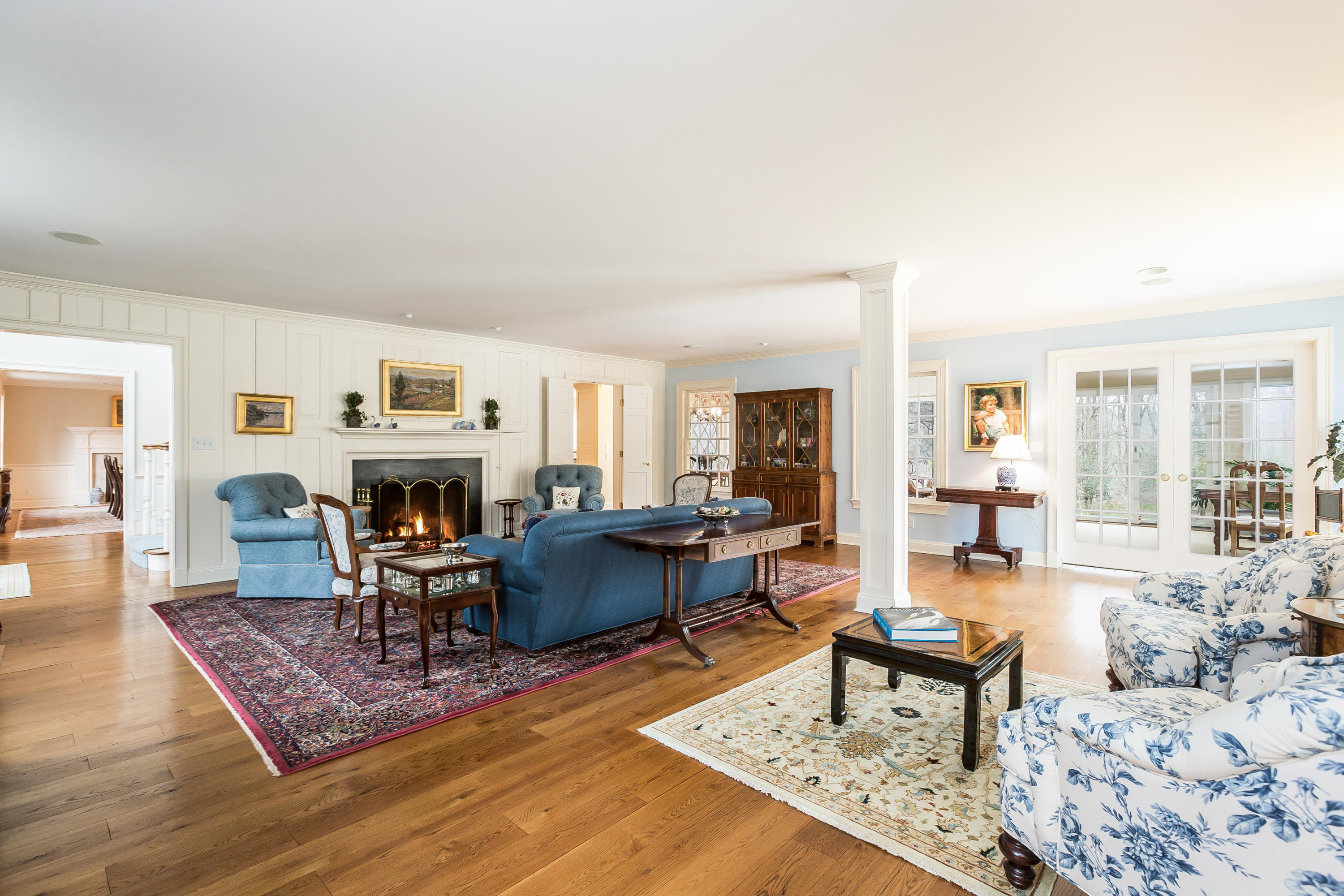 109 Rosebrook Road New Canaan, CT 06840 - Photo 10 of 47 a living room with furniture and a fireplace